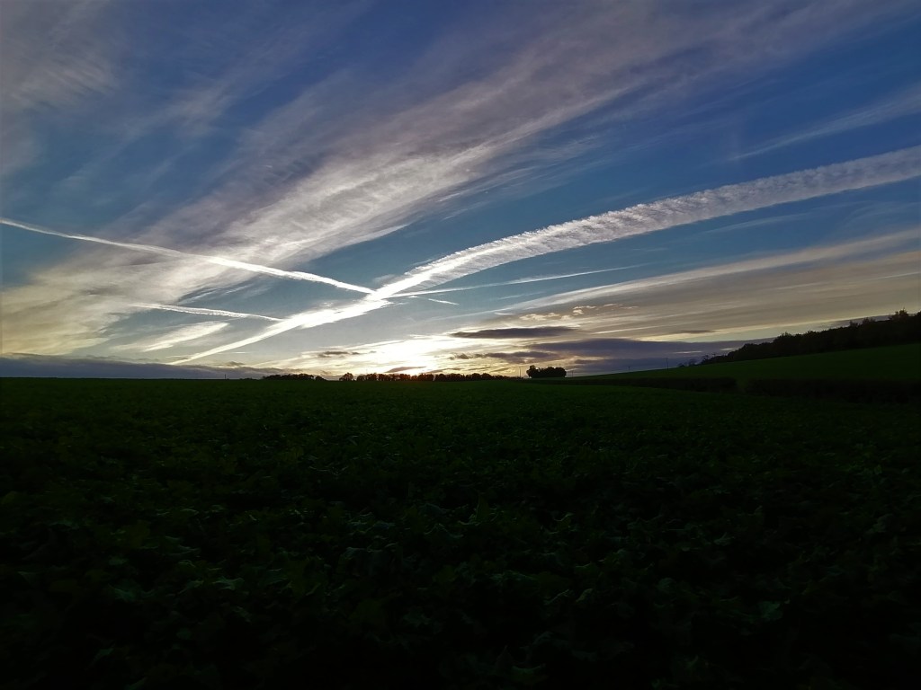 long clouds, with bright sunlight