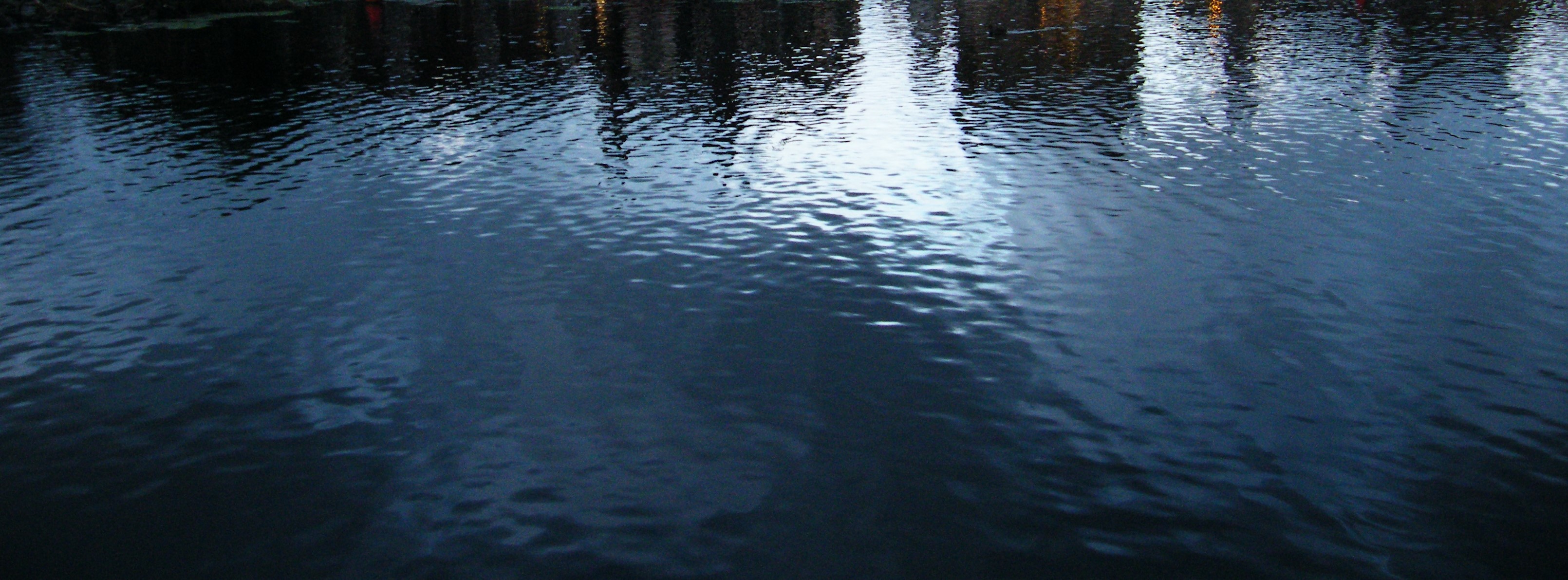 houses shadow caster in river